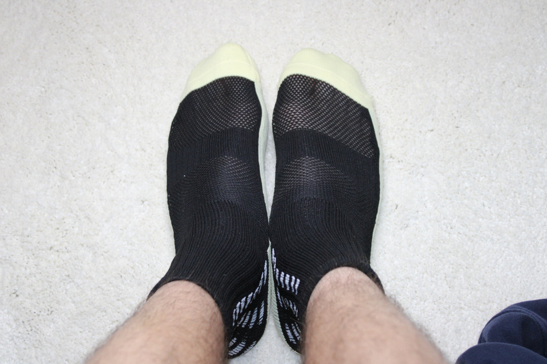 316 XI Grip Socks worn on feet showing secure fit and grip technology