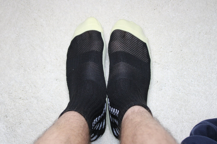 316 XI Grip Socks worn on feet showing secure fit and grip technology