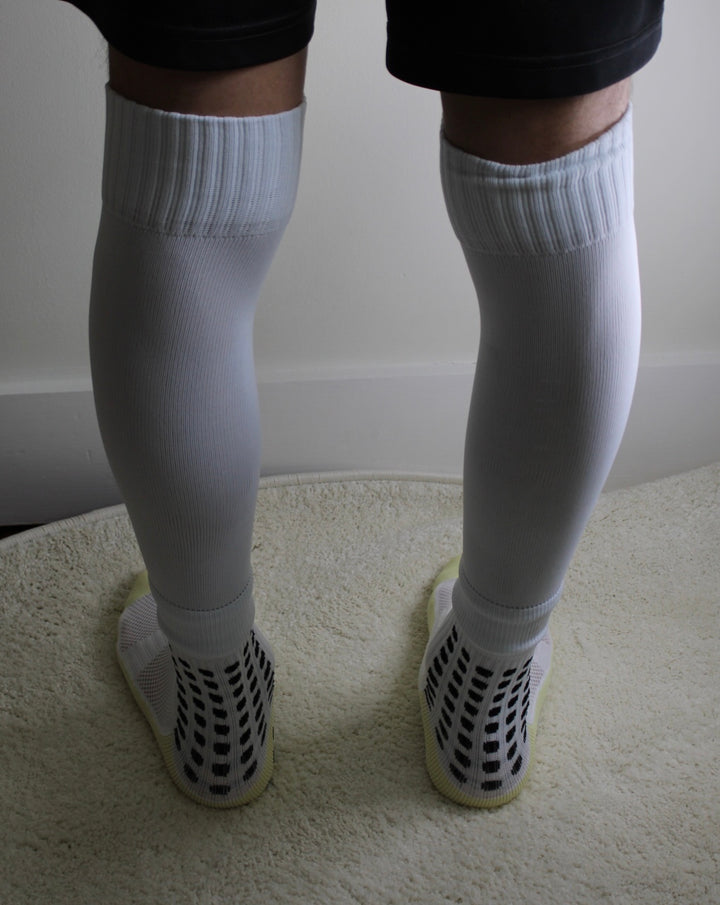 316 XI Soccer Sleeves white colorway front view showing full length compression fit